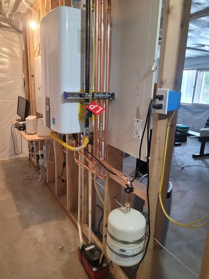 Licensed plumber repairing a kitchen sink in Poestenkill